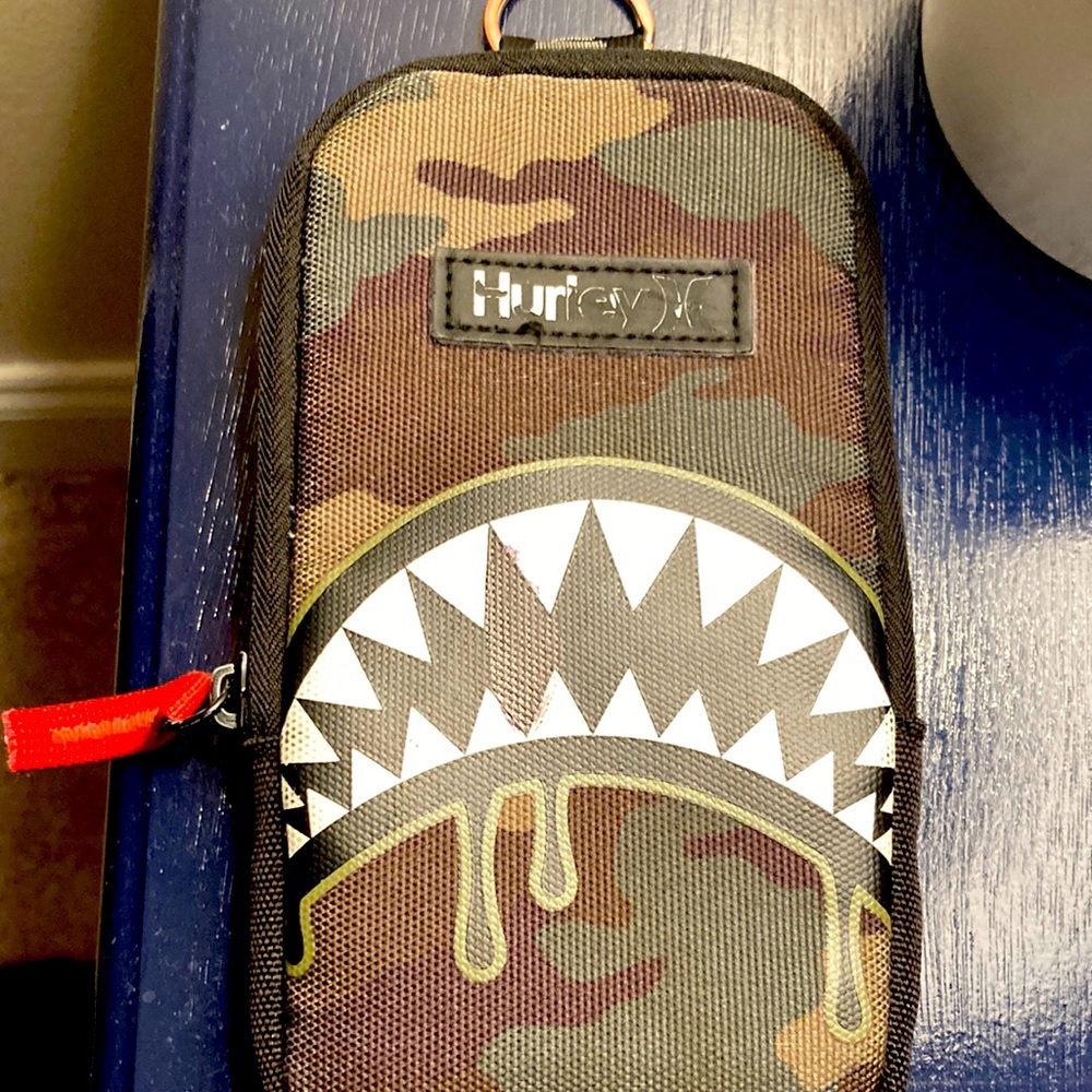 A lil Hurley bag for like money and small toys